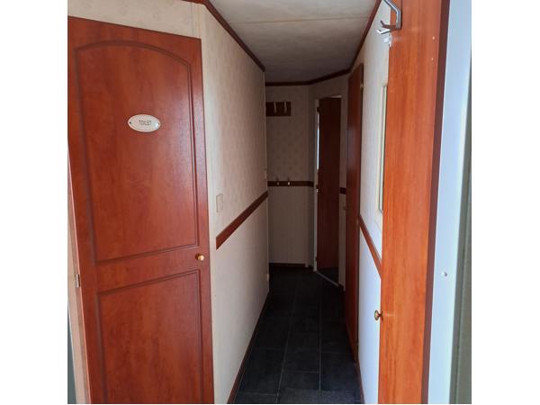 Te koop stacaravan 11 x 3,70 meter