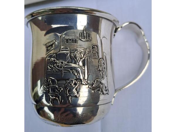 Oude Gero 90 verzilverde geboortebeker met bestek.