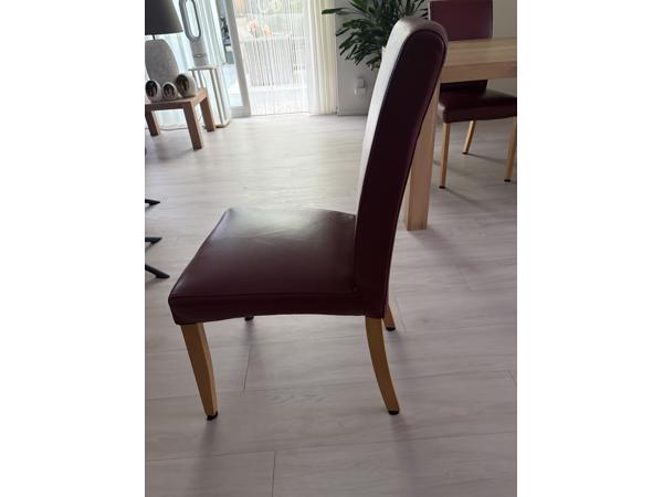 Vier prima leren eethoekstoelen