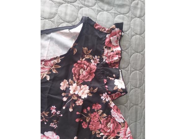 mouwloos luchtig shirt bloemen L