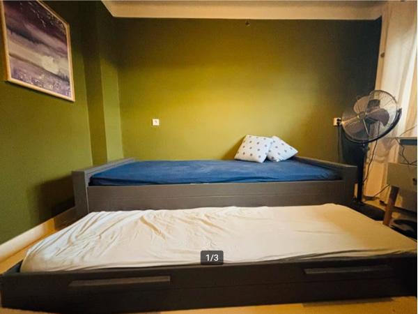 Kinderbed grijs met lade voor extra bed