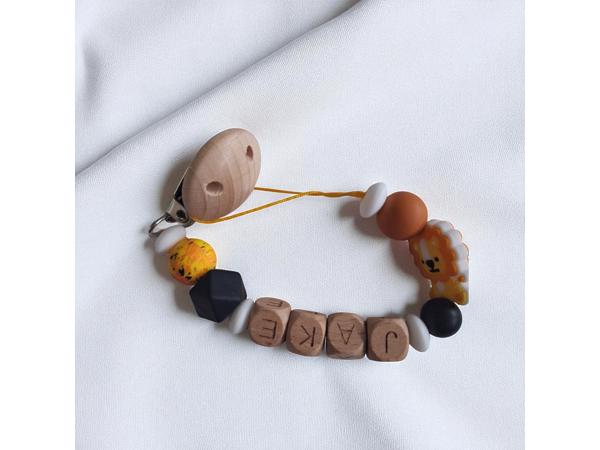 Gepersonaliseerde naam speenkoord oranje leeuwtje