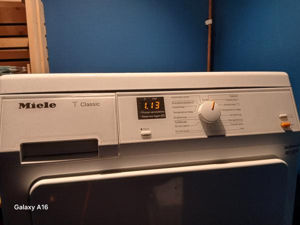 Miele Wasdroger met constant melding: " pluizen verwijderen"