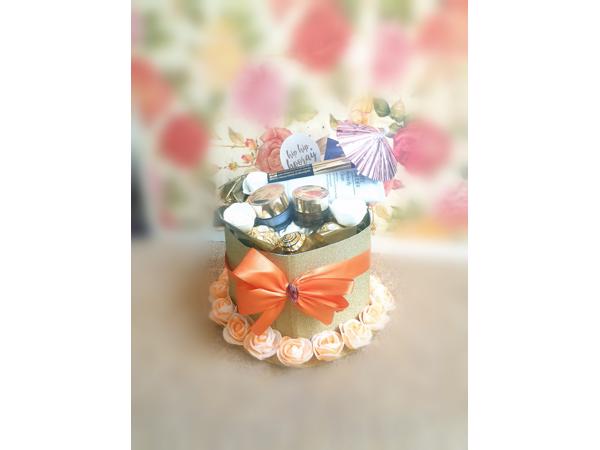 Bloemdecoratie flowerbox moederdag cadeau make-up giftset