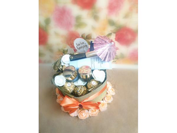 Bloemdecoratie flowerbox moederdag cadeau make-up giftset