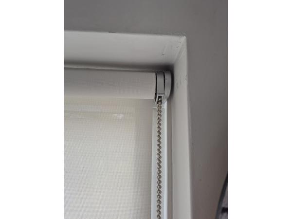 Rolgordijn doorzichtig. Breed 1.28 m