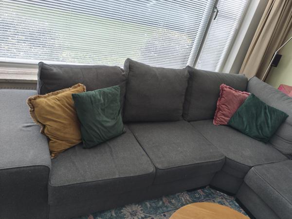 Grote grijze hoekbank