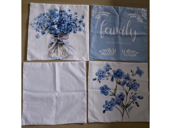 Set van 4 kussenhoezen lichtblauwe flowers met tekst 45x45cm