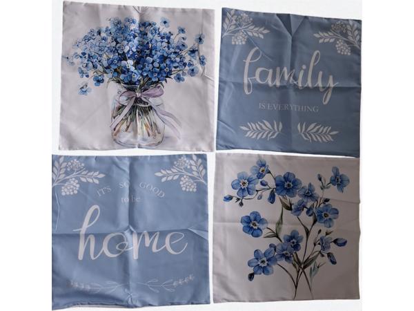 Set van 4 kussenhoezen lichtblauwe flowers met tekst 45x45cm