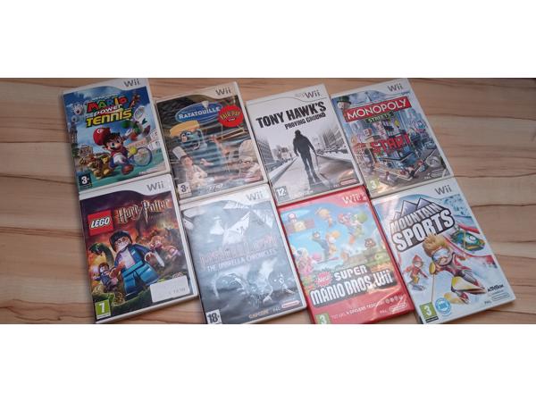 Nintendo Wii + 2 controllers + 2 nunchuks + 8 spelletjes