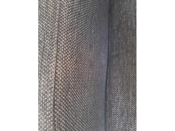 Grijze fauteuil
