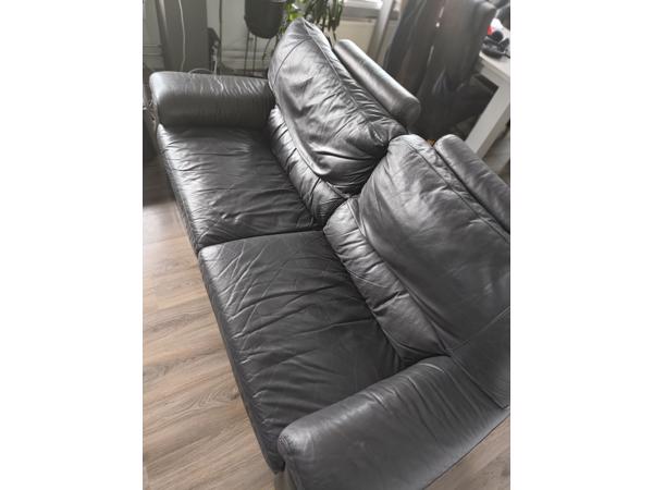 Bruine leren driezitter bank