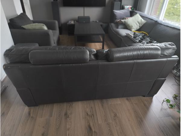 Bruine leren driezitter bank