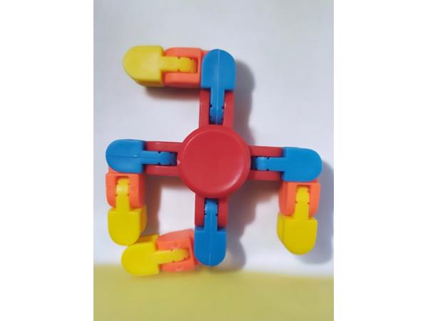 Flexibele Fidget Spinner rood meerkleurig