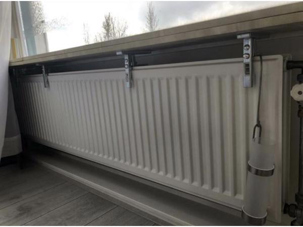 4 verstelbare plankdragers voor de radiator