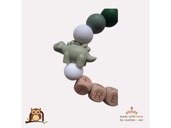 nr 12 noekies naam speenkoord dino stekel khaki groen wit