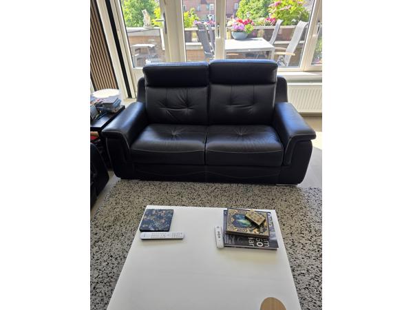 Lederen bankstel met relaxfunctiei