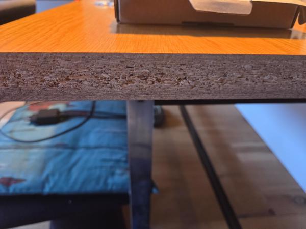 Eettafel modern staal onderstel blad beschadigd