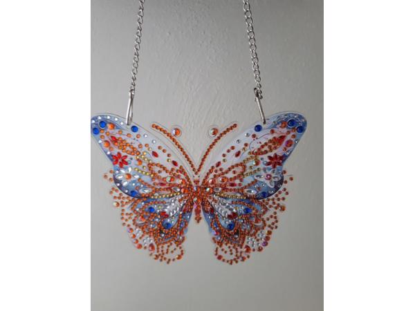 Raamhangers gemaakt van dimond painting