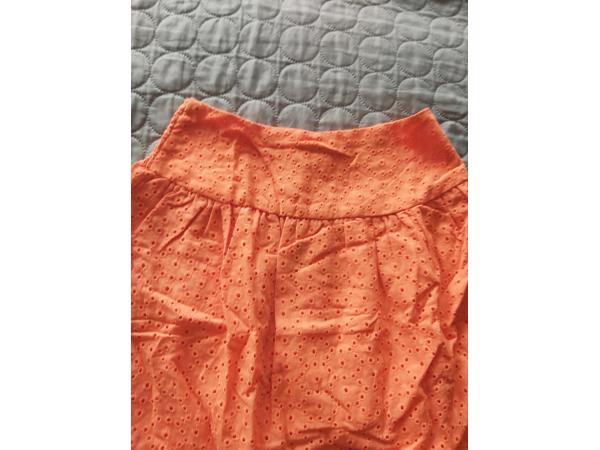 Drole de Copine rok gaatjes patroon oranje S/M