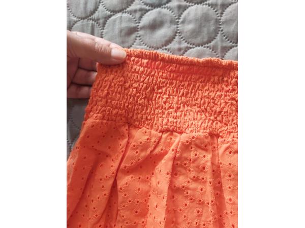 Drole de Copine rok gaatjes patroon oranje S/M