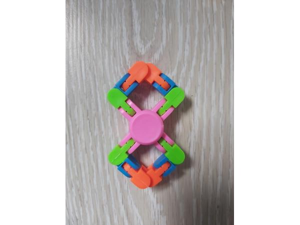 Flexibele Fidget Spinner roze meerkleurig