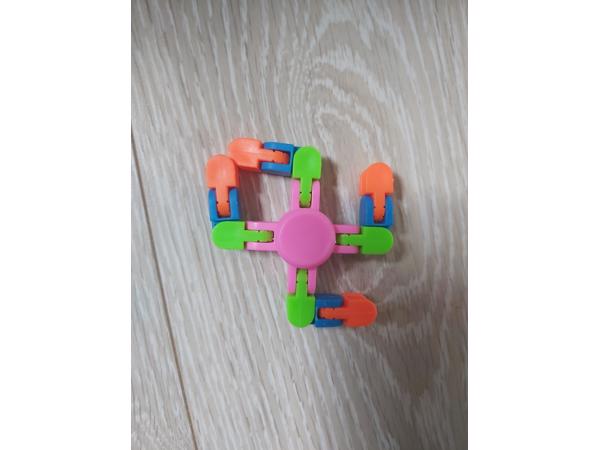 Flexibele Fidget Spinner roze meerkleurig