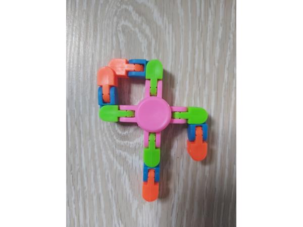 Flexibele Fidget Spinner roze meerkleurig