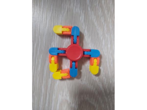 Flexibele Fidget Spinner rood meerkleurig