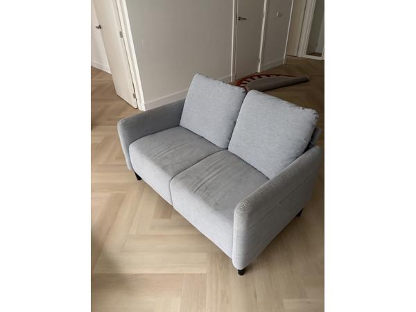 Twee persoons bankstel grijs