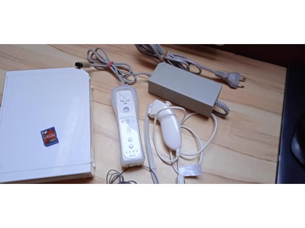 Nintendo Wii + 1 controller + 1 nunchuk