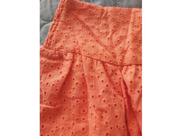 Drole de Copine rok gaatjes patroon oranje M/L 38/40