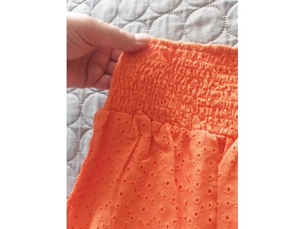 Drole de Copine rok gaatjes patroon oranje M/L 38/40