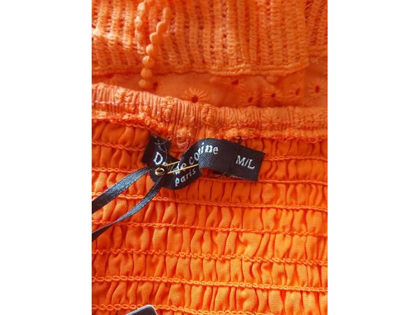 Drole de Copine rok gaatjes patroon oranje M/L 38/40