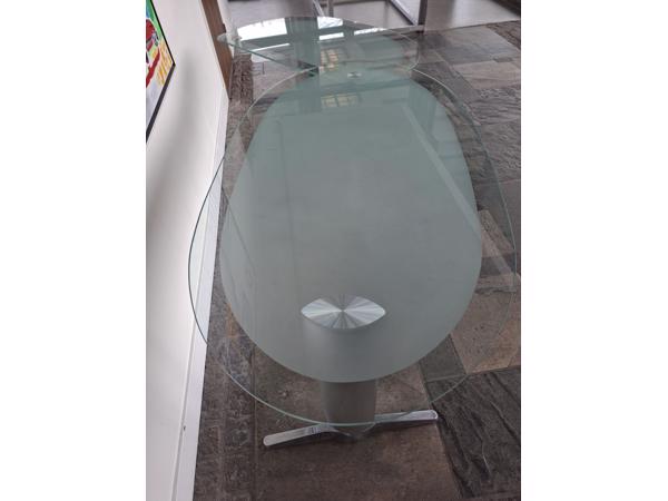 Glazen bureautje . Twee delen, draaibaar zijblad. RVS onderstel.