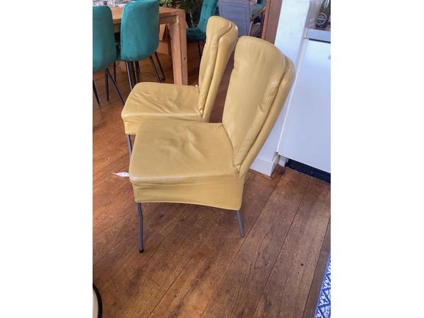4 gele leren stoelen