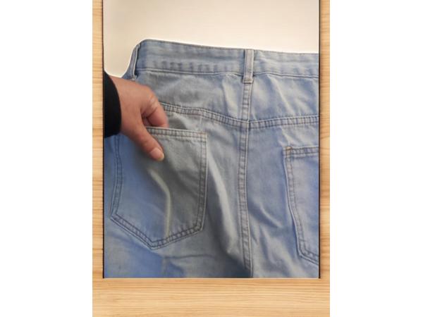 wijde jeans driekwart lang met omslagpijp lichtblauw 32 M/L