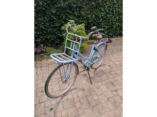 Sparta damesfiets met bagagedrager voorop