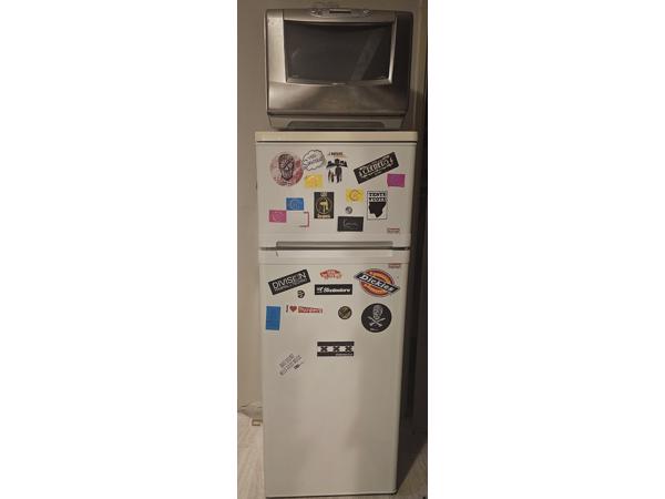 Refrigerator and microwave in good condition.