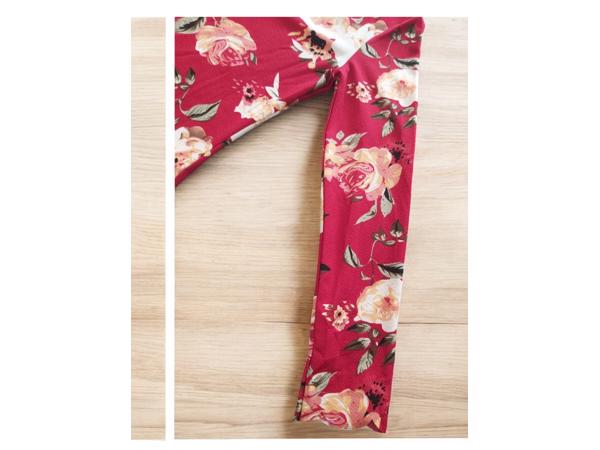 Stretchy top rood bloemenprint met hals koord M