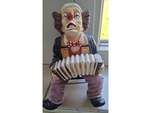 Mooie clowns met muziek groot en klein