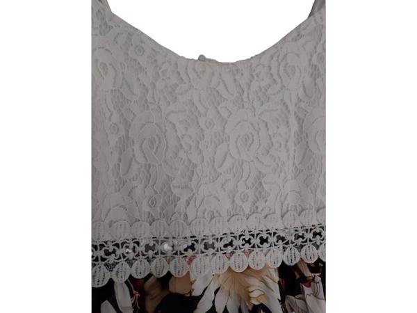 Jurkje zwart met wit kant L 40/42