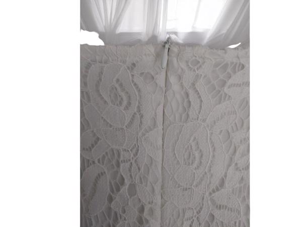 Jurkje zwart met wit kant L 40/42