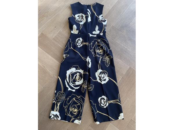 Blauwe jumpsuit met wit/gouden bloemen van Joseph Ribkoff
