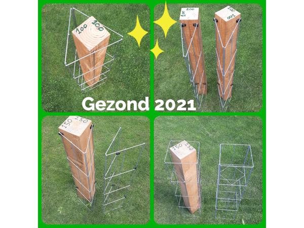 Klimplanten tegen tuinschermen tuinmuren en palen