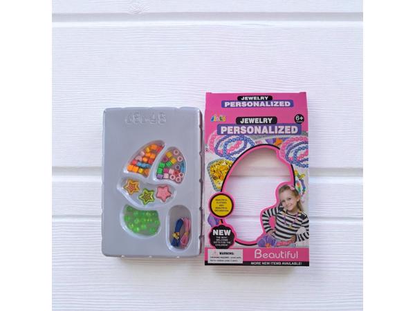 Maak je eigen armband roze doos vanaf 6 jaar