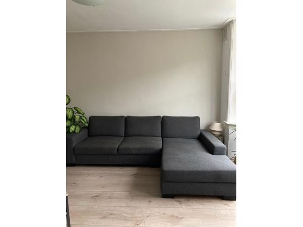 Grijze 3 zits bank met chaise longue en opbergruimte