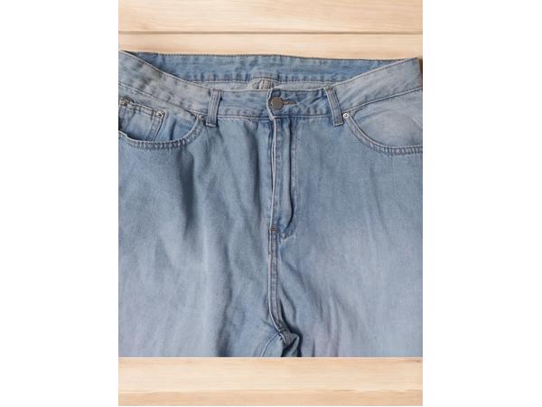 wijde jeans driekwart lang met omslagpijp lichtblauw 32 M/L