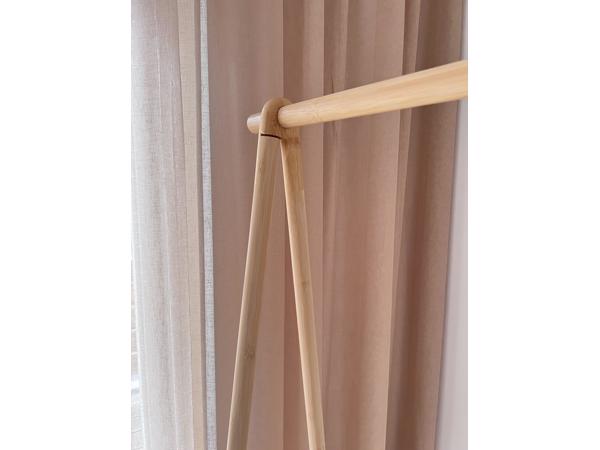 Elegant clothing rack in light bamboo