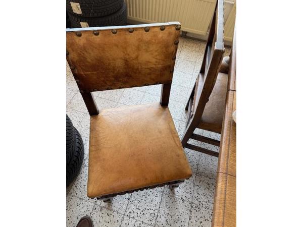 Leren eetkamer stoelen en eettafel